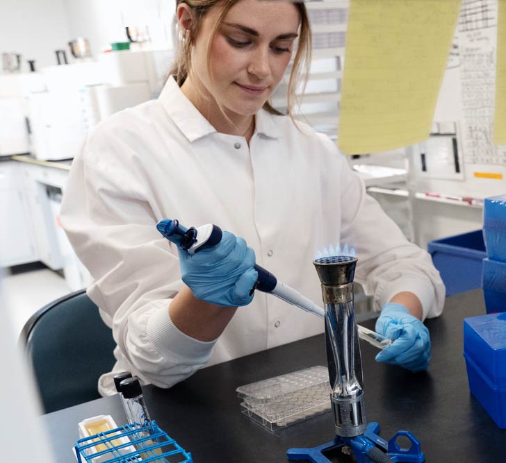 Lab technician working in the ARM & HAMMER™ ScienceHearted Center in Waukesha, WI